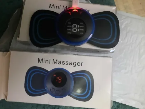 Miaventuras™ – Mini masajeador portátil 8 en 1 photo review
